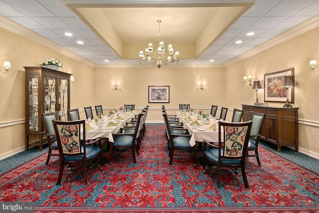 carpeted dining space with crown molding and a chandelier