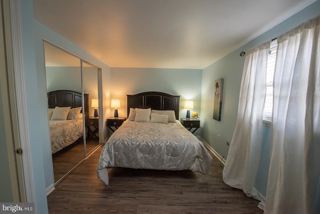 bedroom featuring dark hardwood / wood-style floors