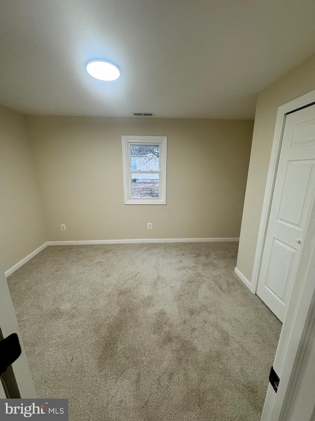 view of carpeted spare room