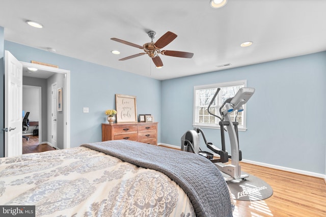 bedroom featuring wood-type flooring and ceiling fan