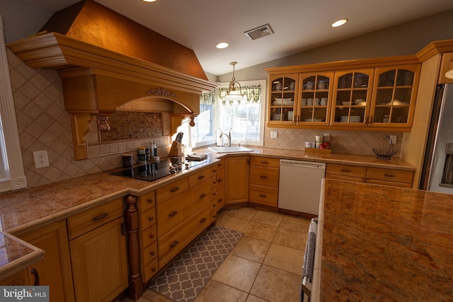 kitchen with vaulted ceiling, sink, black electric stovetop, white dishwasher, and stainless steel fridge with ice dispenser