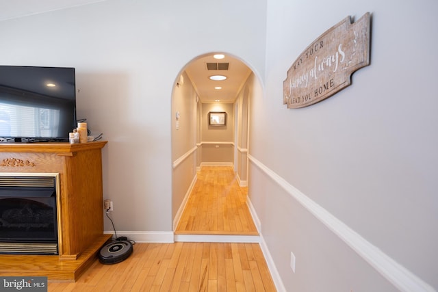 hallway featuring hardwood / wood-style floors