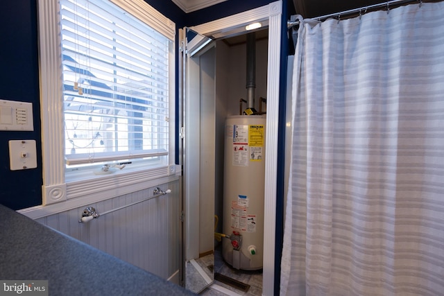 utility room with water heater