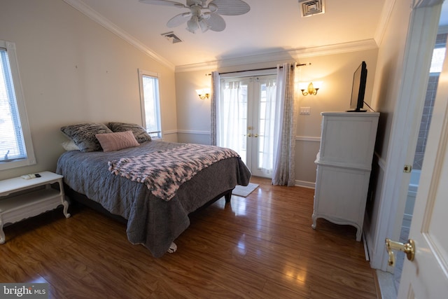 bedroom with lofted ceiling, hardwood / wood-style flooring, ornamental molding, and french doors