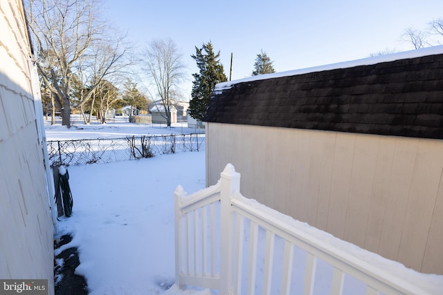 view of yard covered in snow