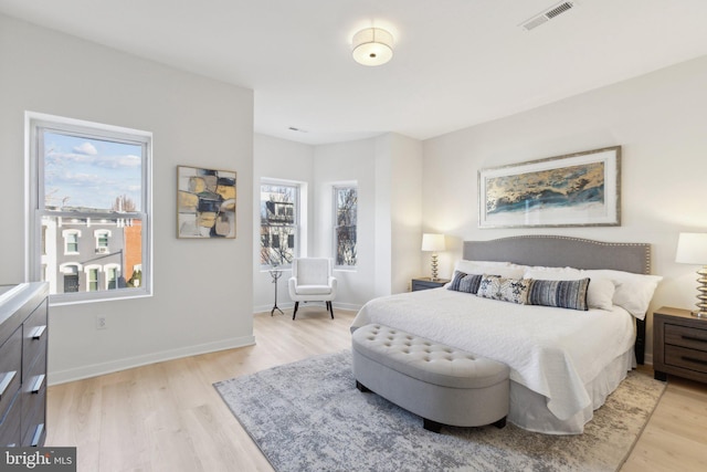 bedroom featuring light wood-type flooring