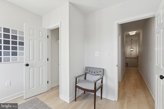 living area with light hardwood / wood-style floors