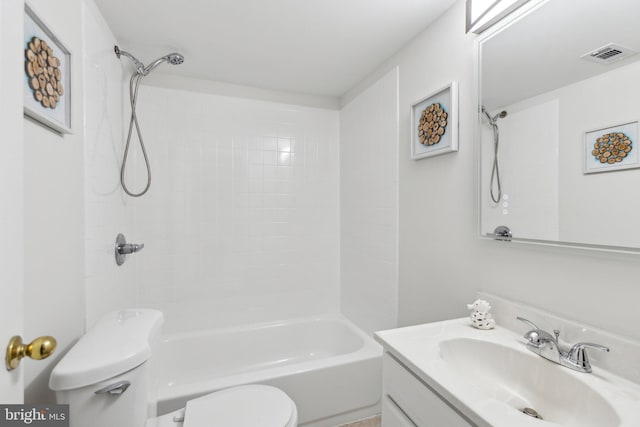 full bathroom with shower / tub combination, vanity, and toilet