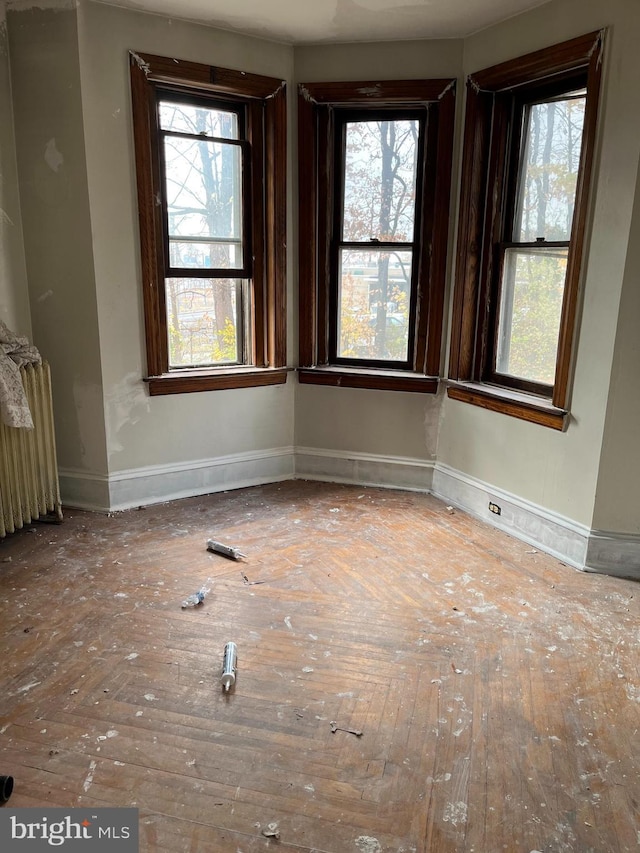 unfurnished room with radiator