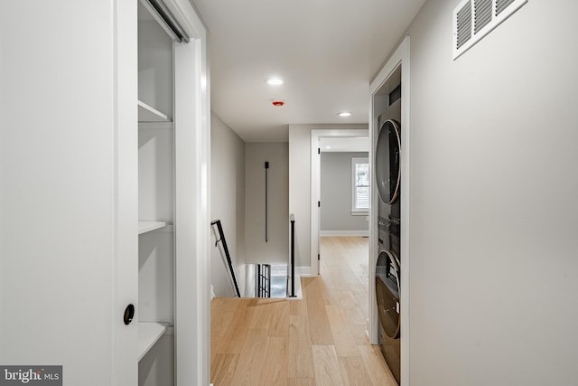 corridor with light wood-type flooring