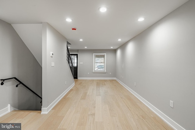 empty room with light hardwood / wood-style floors