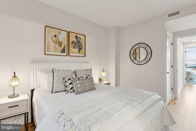 bedroom featuring light hardwood / wood-style flooring