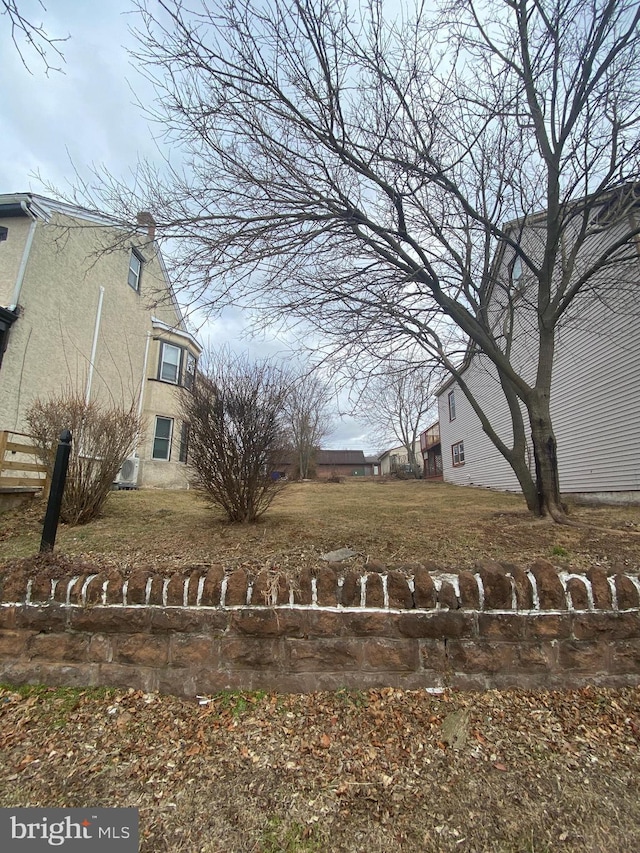 view of yard with central AC