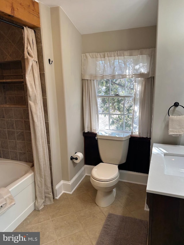 bathroom featuring tile patterned floors, shower / bath combination with curtain, toilet, and baseboards