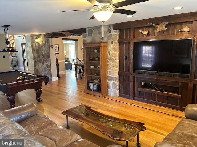 living room with a ceiling fan, billiards, and light wood-style floors