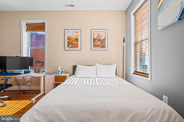 bedroom featuring wood-type flooring