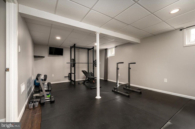 exercise area featuring a drop ceiling