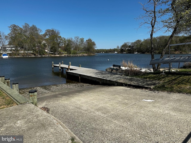 view of dock with a water view