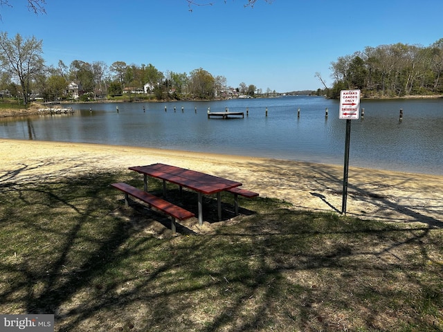 view of dock with a water view