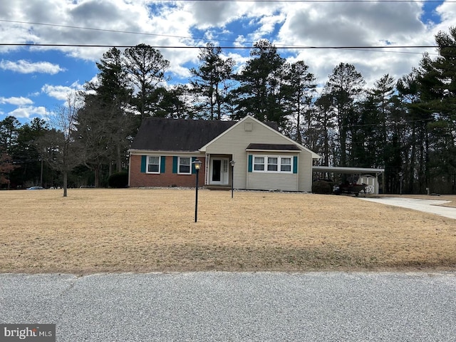 single story home featuring a carport