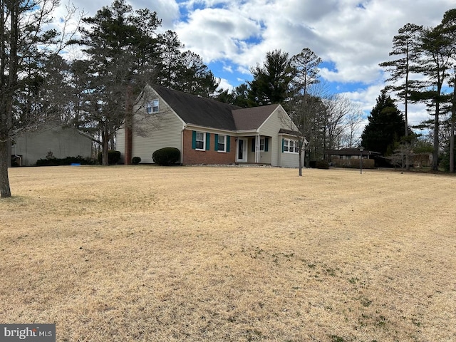 view of front of home with a front yard