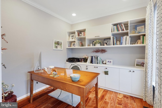 home office with crown molding and wood-type flooring