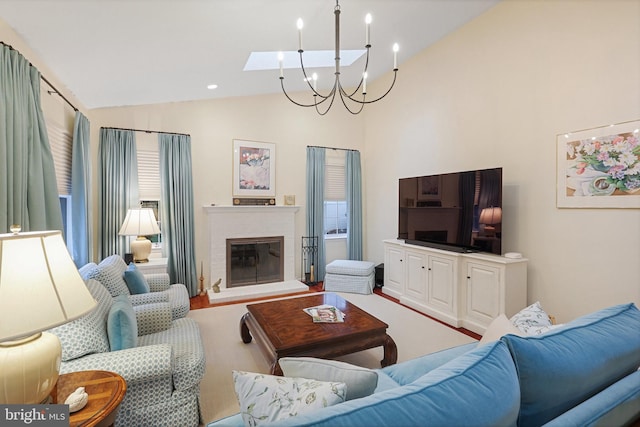 living room featuring vaulted ceiling and a fireplace