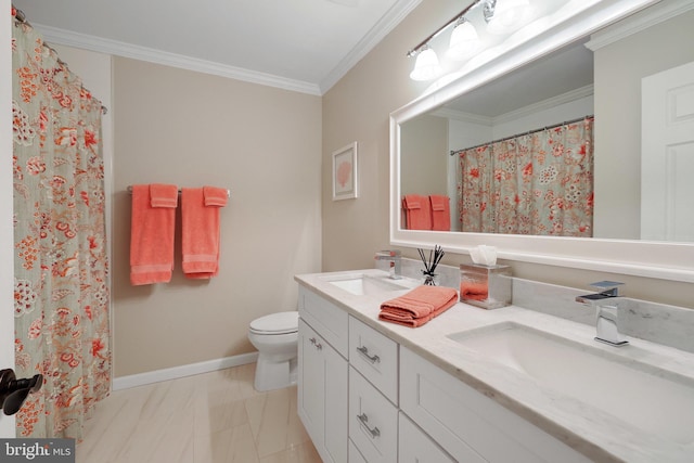 bathroom featuring ornamental molding, toilet, and vanity