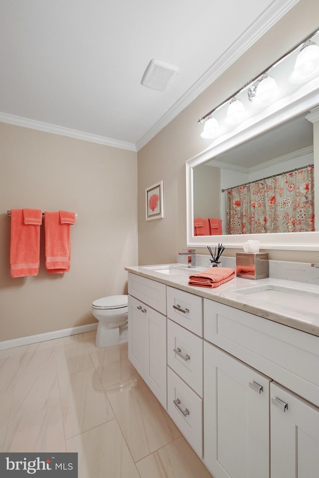 bathroom with vanity, crown molding, curtained shower, and toilet