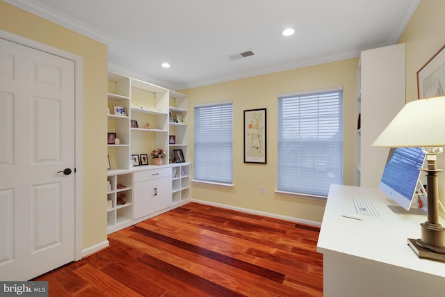 home office with ornamental molding and hardwood / wood-style floors