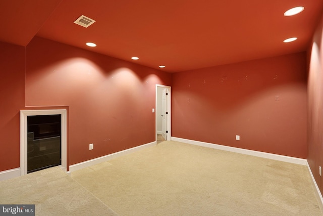 empty room with carpet flooring