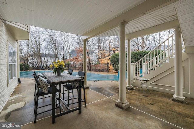 view of patio / terrace with a covered pool