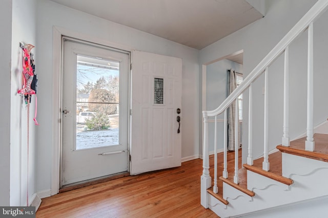 entryway with light hardwood / wood-style flooring