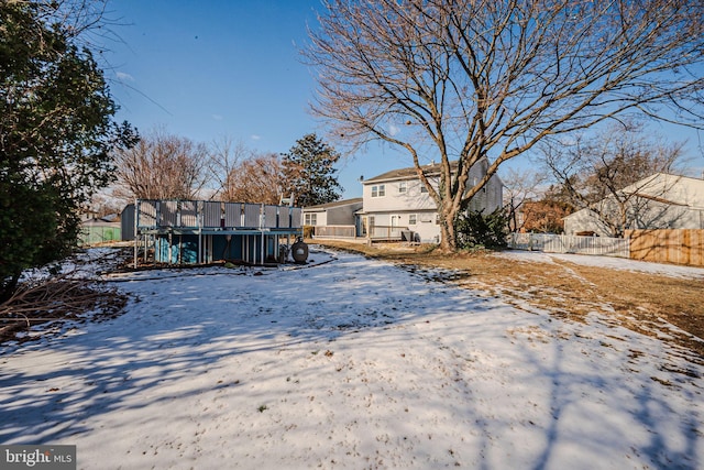 view of snow covered property