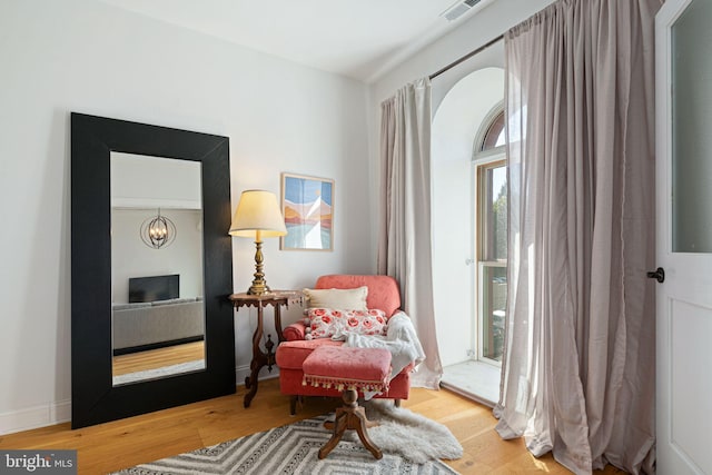 living area featuring wood-type flooring