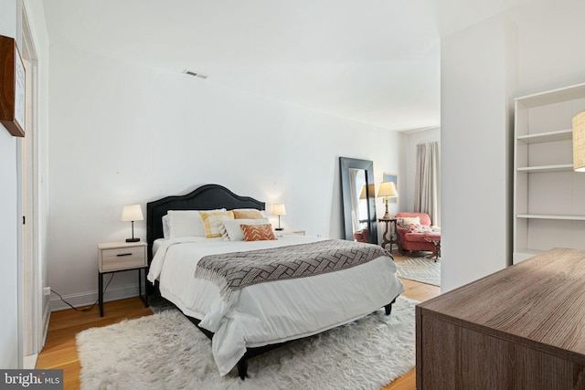 bedroom featuring light hardwood / wood-style flooring