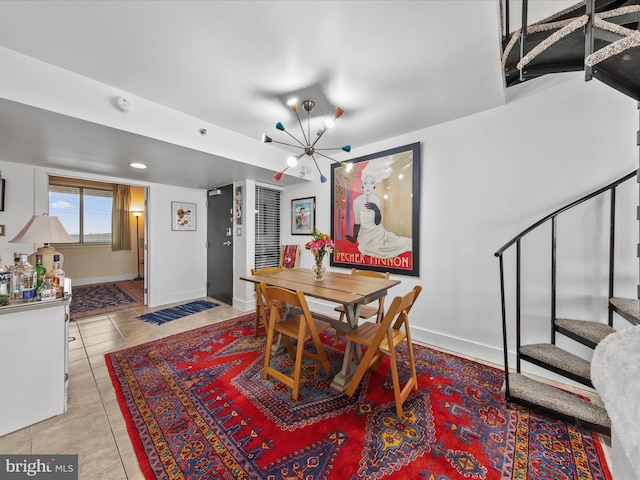 dining area featuring light tile patterned flooring