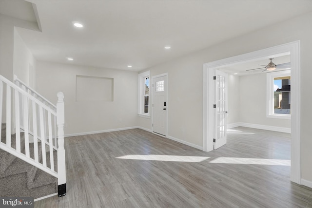 foyer featuring a healthy amount of sunlight and light wood-type flooring