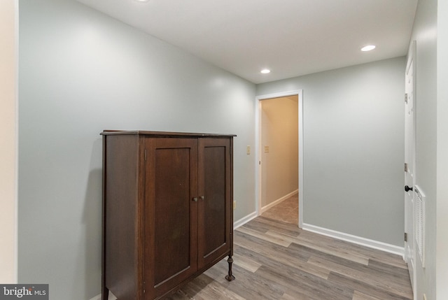 hallway featuring light wood-type flooring