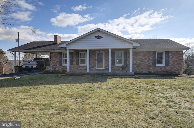 view of front facade featuring a carport, a porch, and a front yard