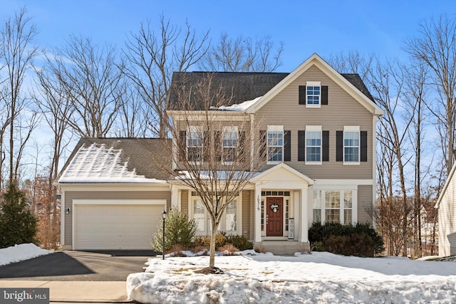 view of front of house with a garage