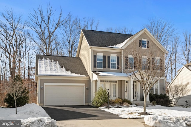 view of front of property with a garage