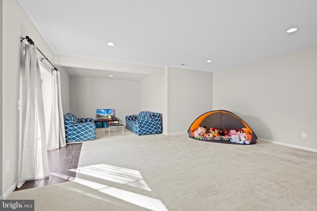 rec room with carpet flooring