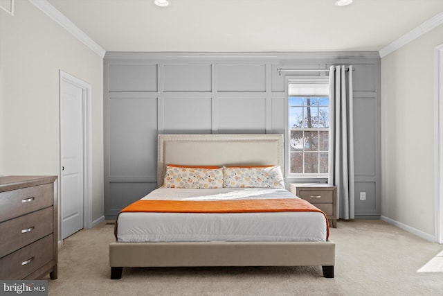 carpeted bedroom featuring crown molding