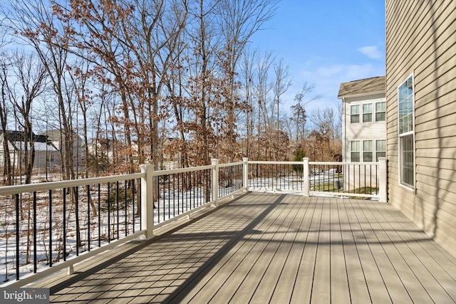 view of snow covered deck