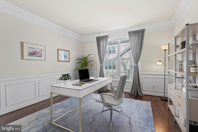 home office with dark hardwood / wood-style flooring and crown molding