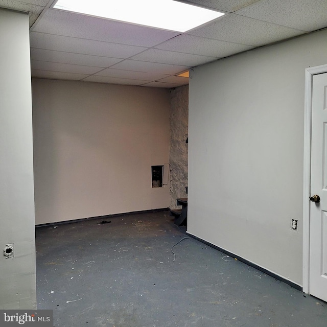 empty room with a paneled ceiling