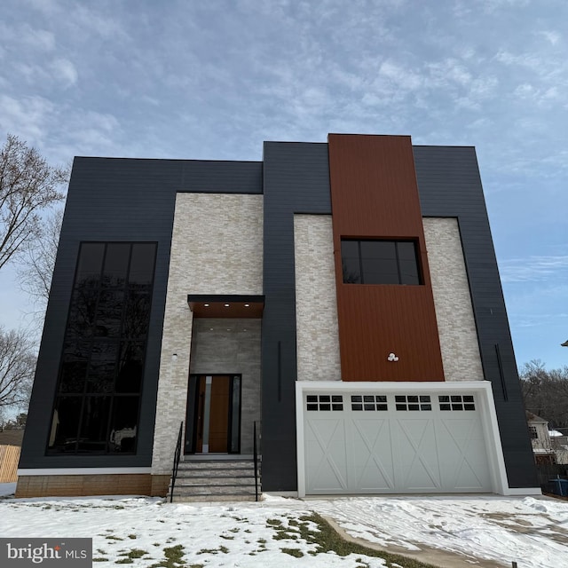 modern home featuring a garage