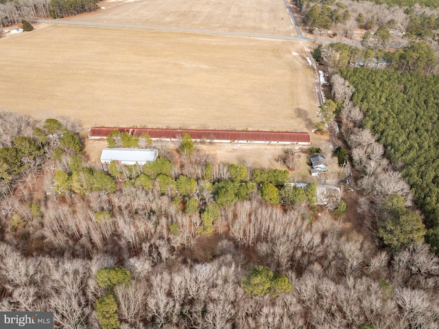 birds eye view of property with a rural view