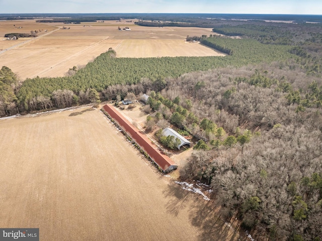 birds eye view of property with a rural view